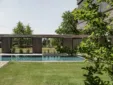 Gartenanlage mit einem Natursteinpool